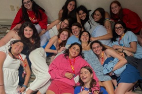 Group of people celebrating on stage