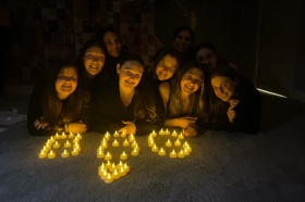 Group of people celebrating on stage