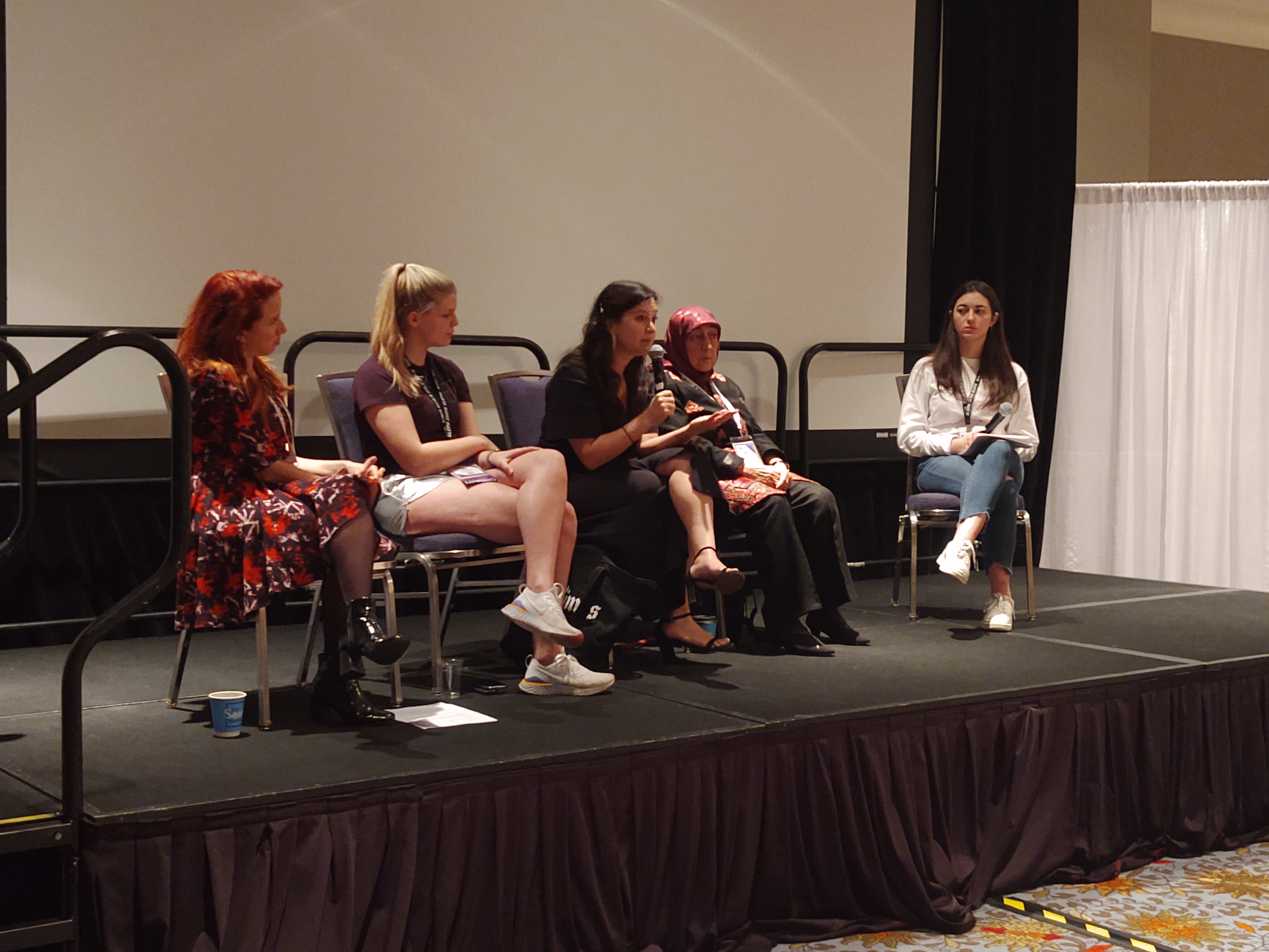 Group of people celebrating on stage