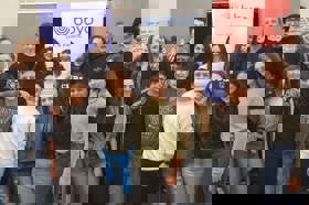 Group of people celebrating on stage