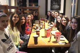 Group of people celebrating on stage