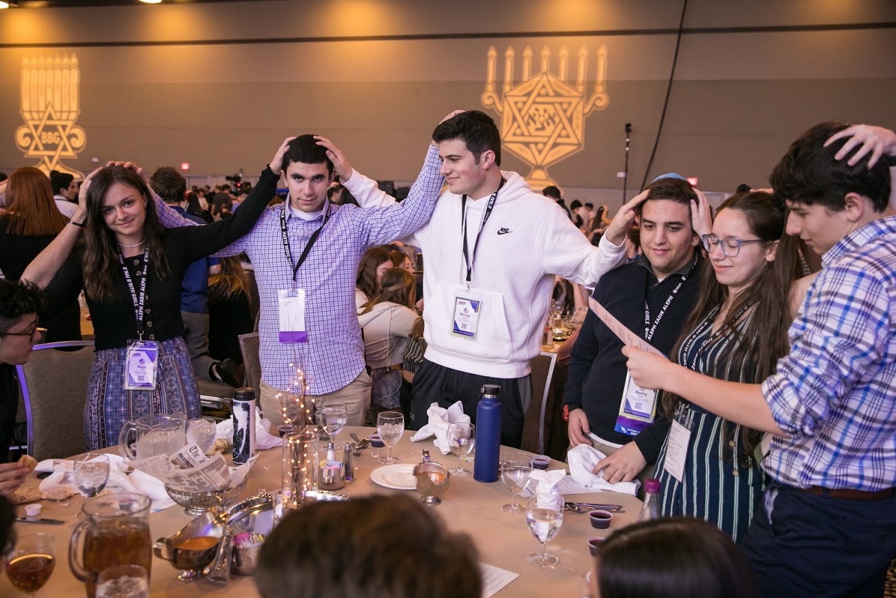 Group of people celebrating on stage