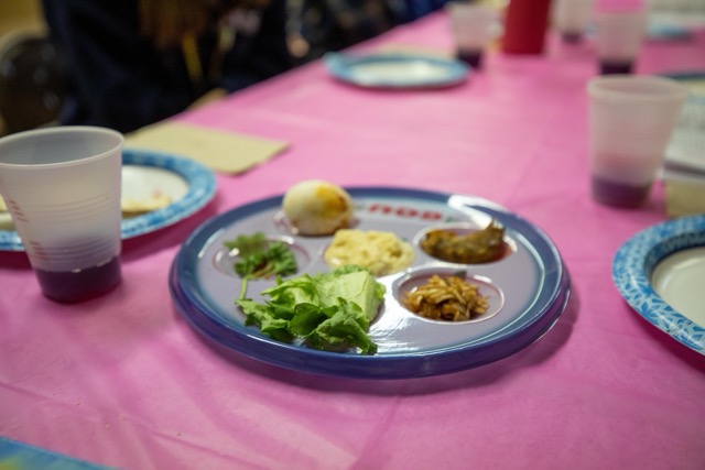 Group of people celebrating on stage