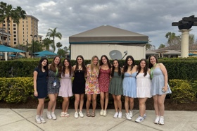 Group of people celebrating on stage