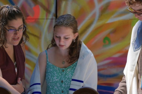 Group of people celebrating on stage