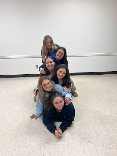 Group of people celebrating on stage