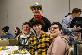 Group of people celebrating on stage