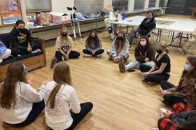 Group of people celebrating on stage