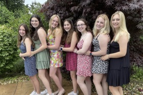 Group of people celebrating on stage