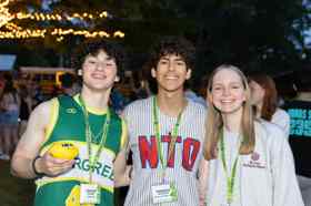 Group of people celebrating on stage