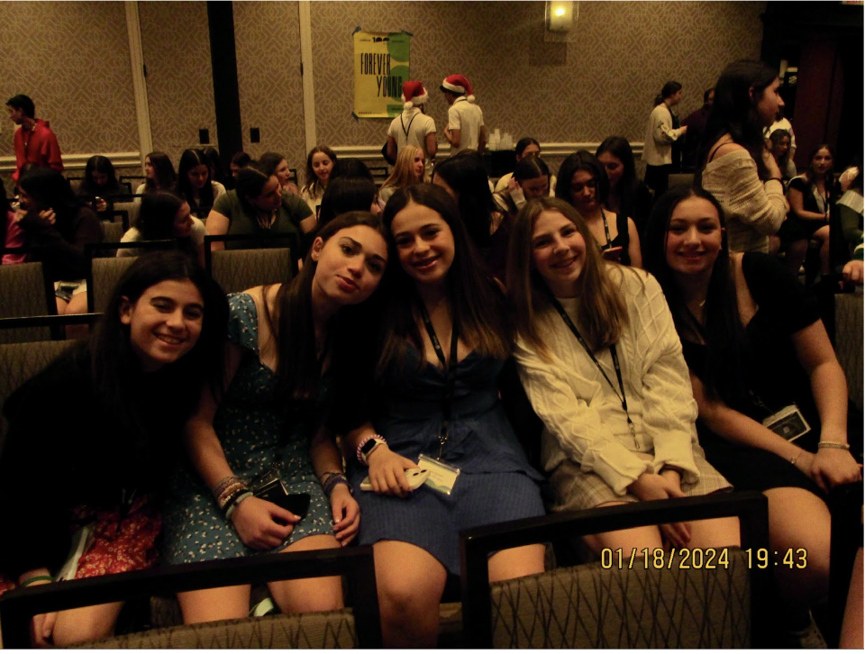 Group of people celebrating on stage