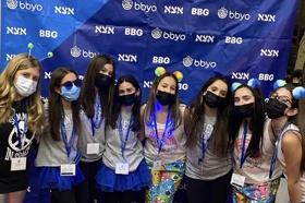 Group of people celebrating on stage