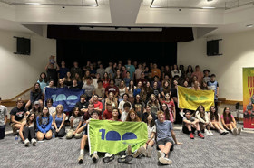 Group of people celebrating on stage