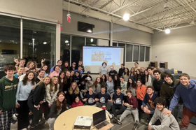 Group of people celebrating on stage