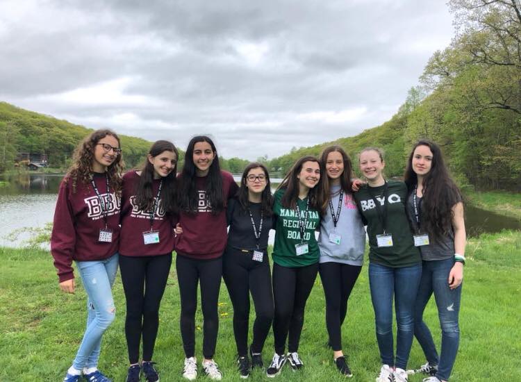 Group of people celebrating on stage