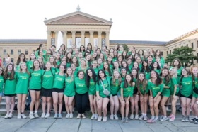 Group of people celebrating on stage