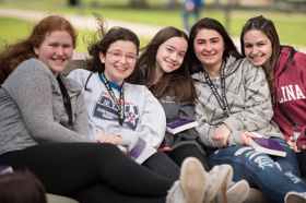 Group of people celebrating on stage