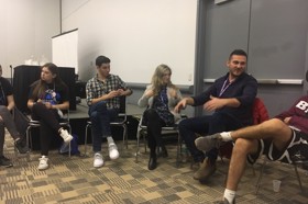 Group of people celebrating on stage