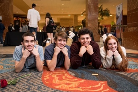 Group of people celebrating on stage