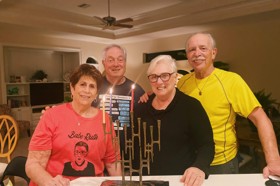 Group of people celebrating on stage