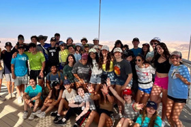 Group of people celebrating on stage