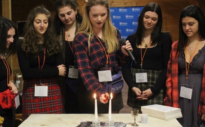 Group of people celebrating on stage