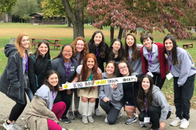 Group of people celebrating on stage