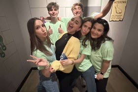 Group of people celebrating on stage