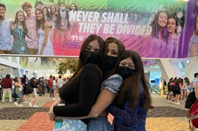 Group of people celebrating on stage