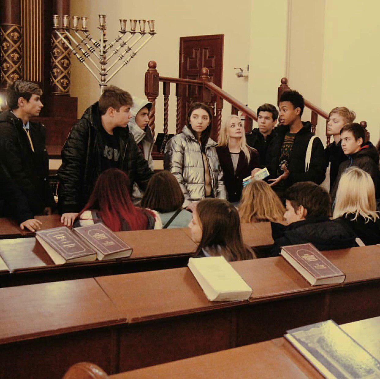 Group of people celebrating on stage
